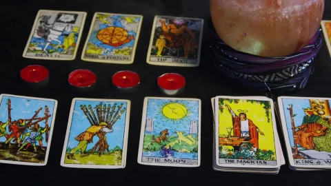 Free Video Stock tarot cards across a table Live Wallpaper - Free Live Wallpaper