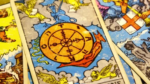 Free Video Stock tarot cards spread across a table Live Wallpaper - Free Live Wallpaper