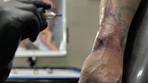 Free Video Stock tattooing a forearm Live Wallpaper - Free Live Wallpaper