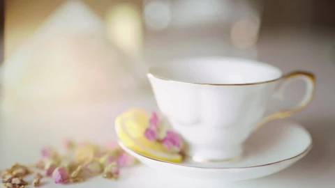 Free Video Stock tea poured into classic china tea cup with flowers Live Wallpaper - Free Live Wallpaper