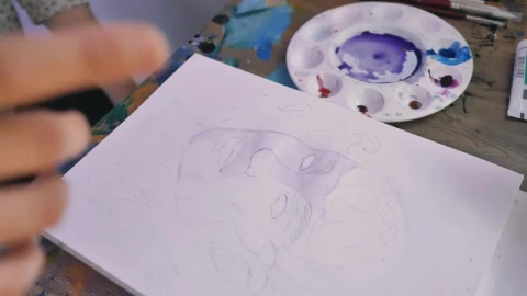 Free Video Stock teacher advising a painting student Live Wallpaper - Free Live Wallpaper