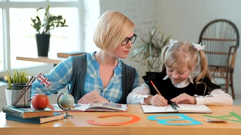 Free Video Stock teacher praises young student for a job well done Live Wallpaper - Free Live Wallpaper