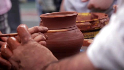 Free Video Stock teaching a child to craft clay pots Live Wallpaper - Free Live Wallpaper