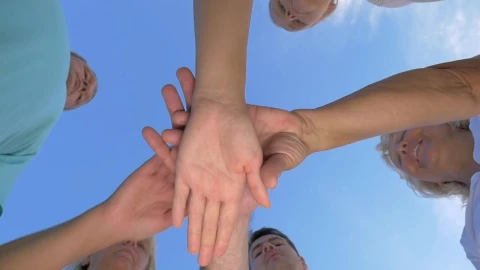 Free Video Stock team holding hands Live Wallpaper - Free Live Wallpaper