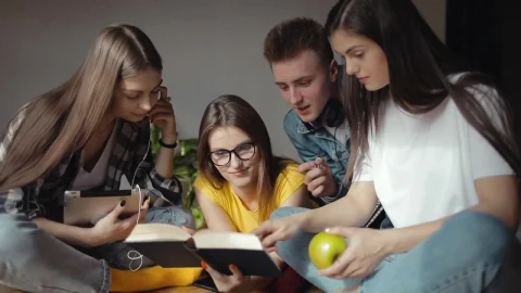 Free Video Stock teenage students share ideas with teacher Live Wallpaper - Free Live Wallpaper