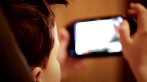 Free Video Stock teenager playing games in a chair Live Wallpaper - Free Live Wallpaper