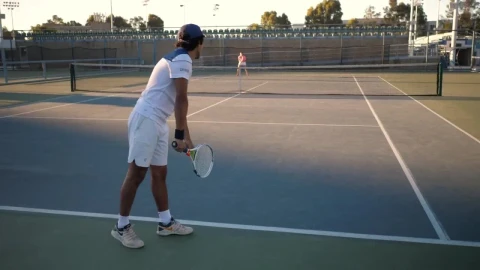 Free Video Stock tennis players at an outdoor court Live Wallpaper - Free Live Wallpaper