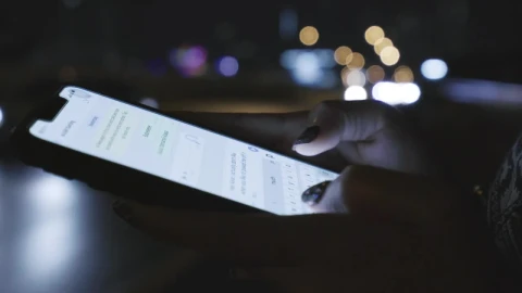Free Video Stock texting on the street at night Live Wallpaper - Free Live Wallpaper