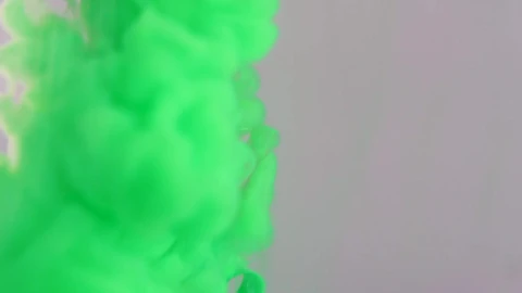 Free Video Stock texture of a cloud of green ink entering water Live Wallpaper - Free Live Wallpaper