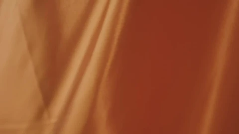 Free Video Stock texture of an orange fabric while waving Live Wallpaper - Free Live Wallpaper