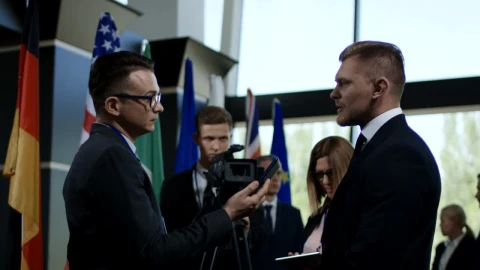 Free Video Stock the politician being interviewed by a journalist Live Wallpaper - Free Live Wallpaper