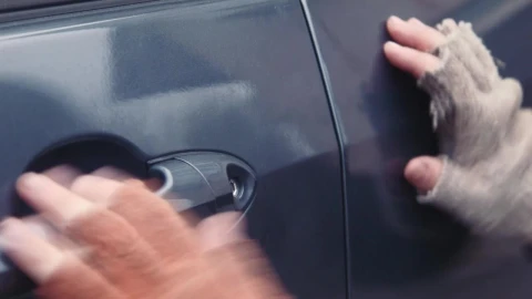 Free Video Stock thief unlocking a car door Live Wallpaper - Free Live Wallpaper