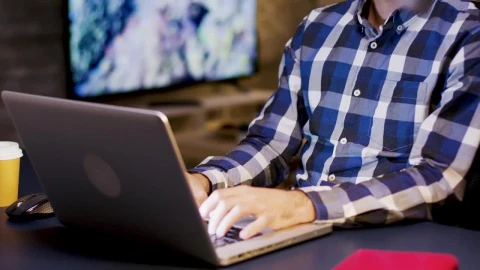 Free Video Stock thinking man places hand on chin in home office Live Wallpaper - Free Live Wallpaper