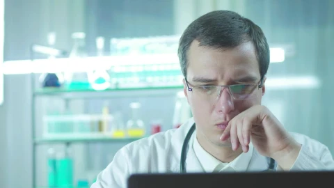 Free Video Stock thoughtful scientist on the lab Live Wallpaper - Free Live Wallpaper