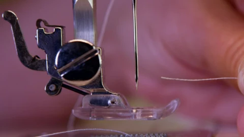 Free Video Stock threading a sewing machine needle Live Wallpaper - Free Live Wallpaper