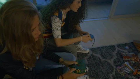 Free Video Stock three young friends gaming in the living room Live Wallpaper - Free Live Wallpaper