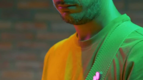 Free Video Stock tilt of a guitarist playing a song Live Wallpaper - Free Live Wallpaper