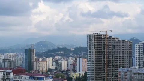 Free Video Stock time lapse of a tower crane in a construction site Live Wallpaper - Free Live Wallpaper