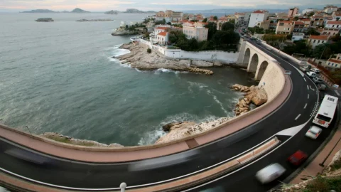 Free Video Stock time lapse of the coast with a street with traffic Live Wallpaper - Free Live Wallpaper