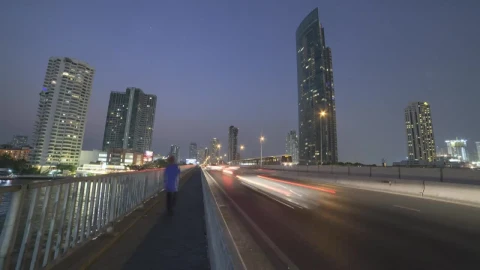 Free Video Stock time lapse of traffic and pedestrians at night Live Wallpaper - Free Live Wallpaper