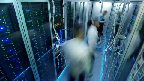Free Video Stock timelapse of engineers working on data center Live Wallpaper - Free Live Wallpaper