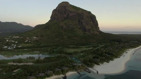 Free Video Stock tiny village in the shadow of a mountain Live Wallpaper - Free Live Wallpaper
