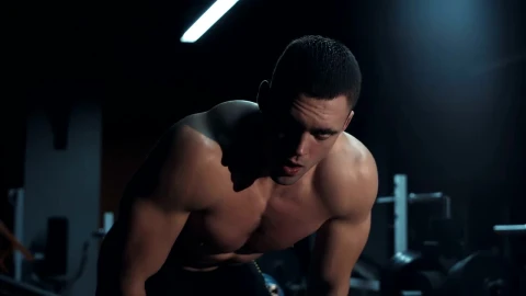 Free Video Stock tired athlete in a dark gym Live Wallpaper - Free Live Wallpaper