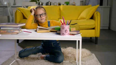 Free Video Stock tired child trying to study Live Wallpaper - Free Live Wallpaper