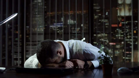 Free Video Stock tired man sleeping at his desk in the office Live Wallpaper - Free Live Wallpaper