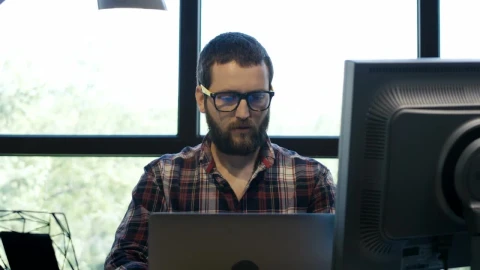 Free Video Stock tired man stretching and his desk Live Wallpaper - Free Live Wallpaper