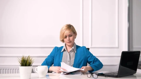 Free Video Stock tired woman fed up with work throws papers in air Live Wallpaper - Free Live Wallpaper