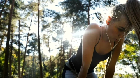 Free Video Stock tired woman jogging outside stops for a breath Live Wallpaper - Free Live Wallpaper