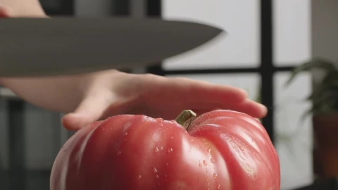 Free Video Stock tomato being prepared in a kitchen Live Wallpaper - Free Live Wallpaper