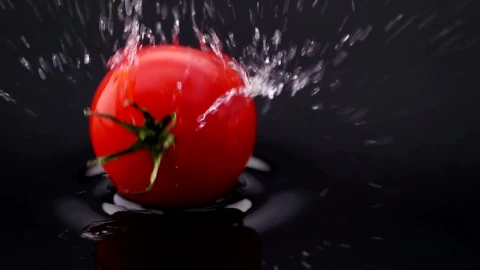 Free Video Stock tomato falling into black water Live Wallpaper - Free Live Wallpaper