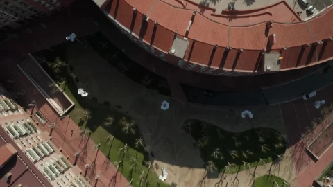 Free Video Stock top aerial shot crossing barcelona buildings Live Wallpaper - Free Live Wallpaper