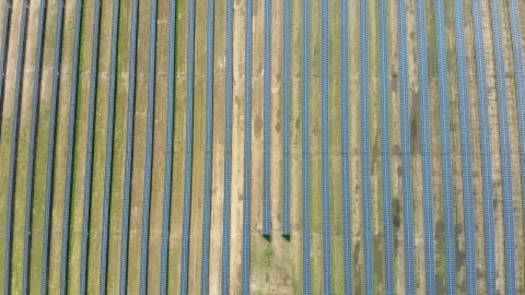 Free Video Stock top aerial shot of a field of solar panels Live Wallpaper - Free Live Wallpaper