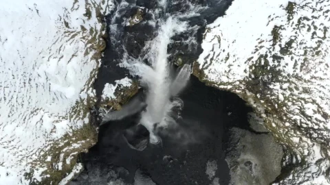 Free Video Stock top aerial shot of a waterfall in a winter forest Live Wallpaper - Free Live Wallpaper