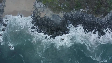 Free Video Stock top aerial shot of seashore with rocks Live Wallpaper - Free Live Wallpaper