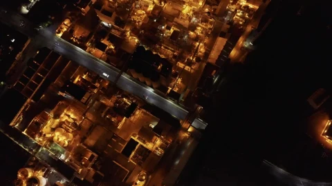Free Video Stock top aerial view of a factory during night time Live Wallpaper - Free Live Wallpaper