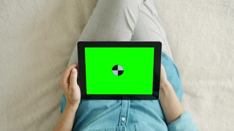 Free Video Stock top shot of a person using a tablet with chroma Live Wallpaper - Free Live Wallpaper