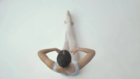 Free Video Stock top view of a ballerina while stretching Live Wallpaper - Free Live Wallpaper