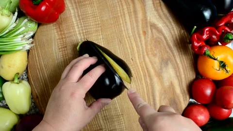 Free Video Stock top view of a person slicing vegetables Live Wallpaper - Free Live Wallpaper