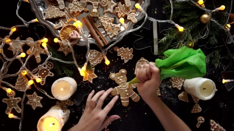 Free Video Stock top view of a persons hands preparing christmas cookies Live Wallpaper - Free Live Wallpaper