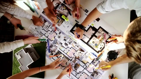 Free Video Stock top view of creative architects working on a project Live Wallpaper - Free Live Wallpaper