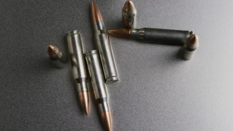 Free Video Stock top view of gun ammunition spinning Live Wallpaper - Free Live Wallpaper