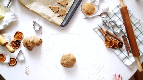 Free Video Stock top view of rolling cookie dough cinnamon and baking tools Live Wallpaper - Free Live Wallpaper