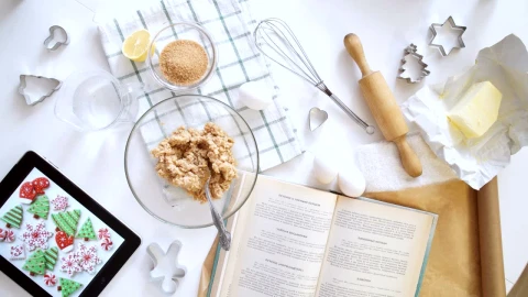 Free Video Stock top view of woman making cookies from recipe on tablet Live Wallpaper - Free Live Wallpaper