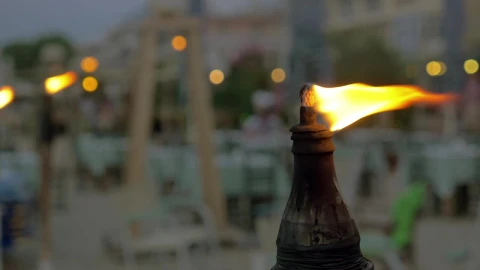 Free Video Stock torch burning at the beach Live Wallpaper - Free Live Wallpaper