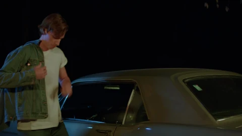 Free Video Stock tough guy with his car outside at night Live Wallpaper - Free Live Wallpaper