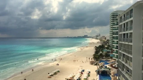 Free Video Stock tourist beach in front of the hotel zone Live Wallpaper - Free Live Wallpaper
